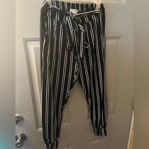 Size L super stretchy Capri joggers. Navy Blue with white stripes.